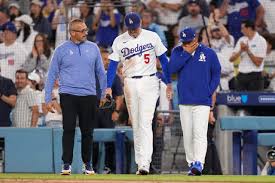Dodgers’ Freddie Freeman exits early after dugout tumble