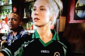 Nancy Carter in the Queen Vic wearing the GAA top. Loyalist campaigner Willie Frazer has demanded a BBC probe after an actress wore a GAA school sports ... - Eastenders-top