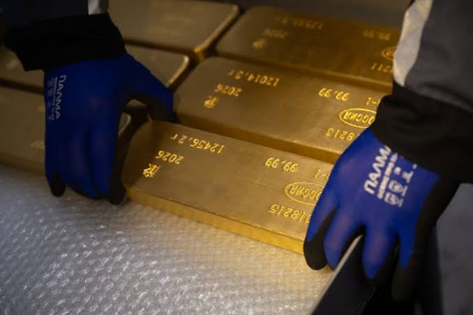 Debasement trade returns as gold and Bitcoin surge and dollar slides; Treasury Secretary Scott Bessent's bond-buyback plan seen as Band-Aid, not fix