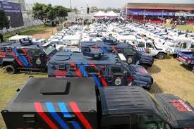 Image result for The Governor spoke at the official handing over of 100 4-door salon cars, 55 Ford Ranger pick-up vans, 10 Toyota Land Cruiser pick-up vans, 15 BMW power bikes, 100 power bikes, Isuzu trucks, three helicopters, two gun boats, 15 armoured personnel carriers, revolving lights, siren and public address systems, vehicular radio communicators, security gadgets including bullet proof vests, helmets and handcuffs, all valued at about N4.765 billion.