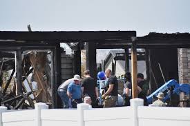 Investigators at the scene of a fatal family shooting near Billings Montana