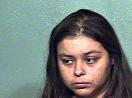 Kristina Michelle Brown, 23, told police she threatened him with a knife because her Oklahoma City neighbor told everyone she had cat sex. - Kristina-Michelle-Brown_3af10