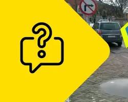 Obraz: Znak drogowy z napisem Zwolnij! lub samochód na drodze z sygnaturą Yanosika