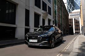 Driverless Taxis Hit London: Can Uber's Wayve Pilot Survive Tesla's Robotaxi Shadow?