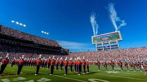 Auburn football quarterback dropping back to pass in front of a packed Jordan-Hare Stadium crowd during the 2026 LSU game