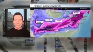 The link between a warming climate and this massive winter storm.