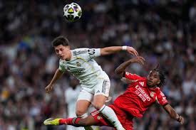 Vinicius scores as Real Madrid sink Benfica to reach Champions League last 16