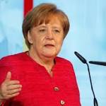 Facing coalition crisis, Merkel seeks migrant talks with EU states