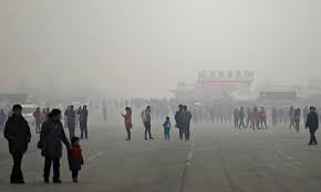 Image result for This picture from January 2013 shows two men walking in Beijing's dense smog. (AFP/Getty Images)