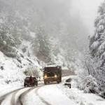 Heavy snow causes travel mayhem