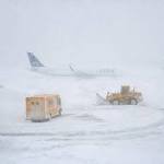 Flooding airport adds misery after