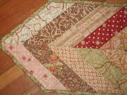 Résultat de recherche d'images pour "oval quilted table toppers"