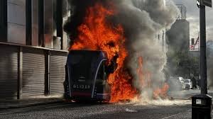Bus set on fire in Belfast at anti-immigration protest