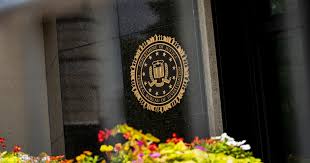Judge dismisses charge against former FBI officials over improper filing