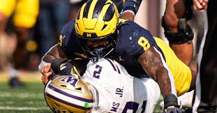 Detroit Lions trade up, pick Michigan EDGE Derrick Moore