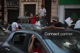 Licensable picture: Algerians watch Austria match on giant screen