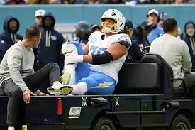 Chargers left tackle Joe Alt carted off field with right ankle injury