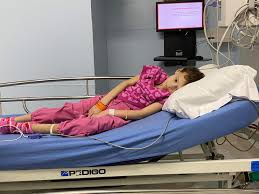 In just a few hours, Santa Claus will walk into a hospital ...