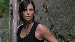 Henry Golding Compares Charlize Theron to Tom Cruise: 'Female Counterpart'