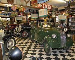 Image of Cotswold Motoring Museum interior with cars on display