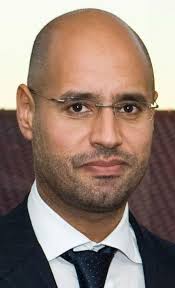 Saif al-Islam Muammar al-Gaddafi (سيف الإسلام معمر القذافي, literally: Sword of Islam Muammar al-Gaddafi) (born June 25, 1972) is the second son of Muammar ... - Saif_al-Islam_Muammar_Al-Gaddafi