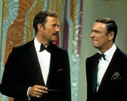 Rowan & Martin's LaughIn 1968 TV series Dan Rowan Dick Martin Goldie Hawn Ruth Buzzi Lily Tomlin Arte Johnson NBC variety show comedy stills 1960s colorful set, AI generated