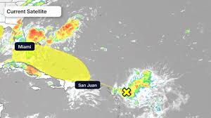 Satellite view and forecast track of the remnants of Tropical Storm Dolly near the Caribbean