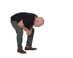 Image of man searching for something on ground