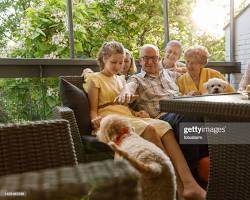 senior couple celebrating with their petの画像