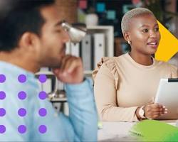 Изображение: family gathered around a table, reviewing their finances on a tablet with an AIpowered budgeting app