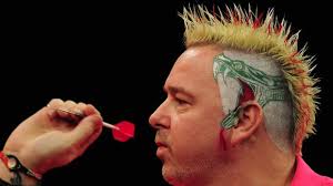 Peter Wright, the darts player nicknamed &#39;Snakebite&#39;, has lived up to expectations by taking to the oche with another remarkable hair do. - article_c847629f8730a459_1355782304_9j-4aaqsk