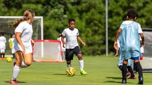 ‘A piece of grass that isn't too bumpy:' Lower income kids scramble for a place to play soccer