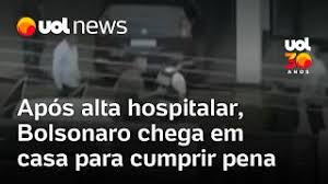 Bolsonaro tem alta hospitalar e chega em casa para cumprir pena, usando colete a prova de balas