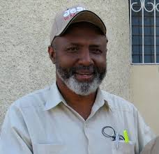... the priest of St. Clare&#39;s Church in the Ti Plas Kazo neighborhood of Port-au-Prince and was known throughout the world as a great leader and advocate ... - Jean-Juste-in-cap