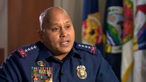 Former Philippine ‘drug war’ police chief runs away from government agents to avoid international arrest warrant