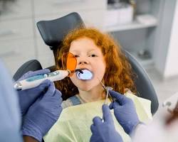 Image of child receiving a dental filling