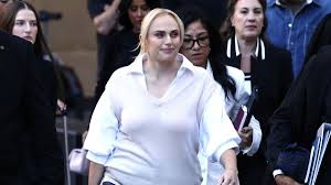 Rebel Wilson arrives at court ahead of taking the stand in defamation case
