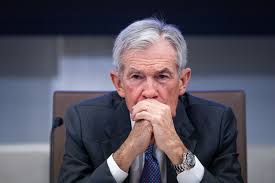 Powell cuts rates in the dark in historic move, with no jobs data and Trump heckling from abroad
