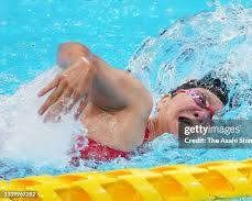 Image of athlete winning the women's 100m backstroke S5