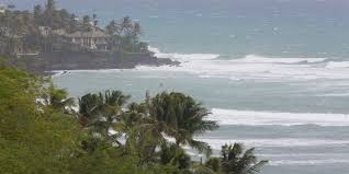 Hurricane Fausto peaks in the Pacific as Tropical Storm Genevieve trails, forecast to become a major storm