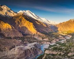 Image of Hunza Valley, Pakistan Traditional village nestled amidst towering mountains