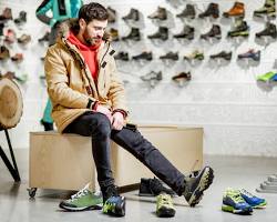Image of person happily shopping for shoes