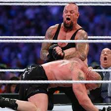 Image result for brock smiles at undertaker