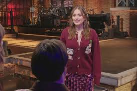 Aimee Lou Wood Pokes Fun at 'SNL' Teeth Sketch Ahead of Hosting in U.K