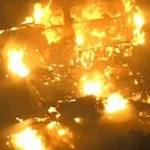 Thousands flee separate wildfires through