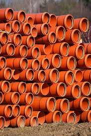 Orange Drainage Pipes In Road Construction Stock Photo ...