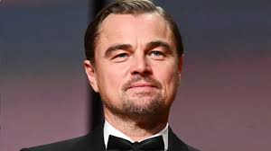 Leonardo DiCaprio recalls Brad Pitt mistaking his dad and stepmom for extras on Once Upon a Time… in...
