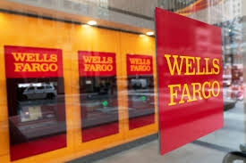 Wells Fargo Says Regulatory Settlement Hit Earnings