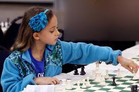 Image result for kid playing chess with older adult