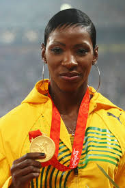 Melaine Walker of Jamaica receives the gold medal during the medal ceremony for the Women&#39;s 400m Hurdles Final held at the National Stadium during Day ... - Olympics%2BDay%2B13%2BAthletics%2Bo6tajd1S18rl